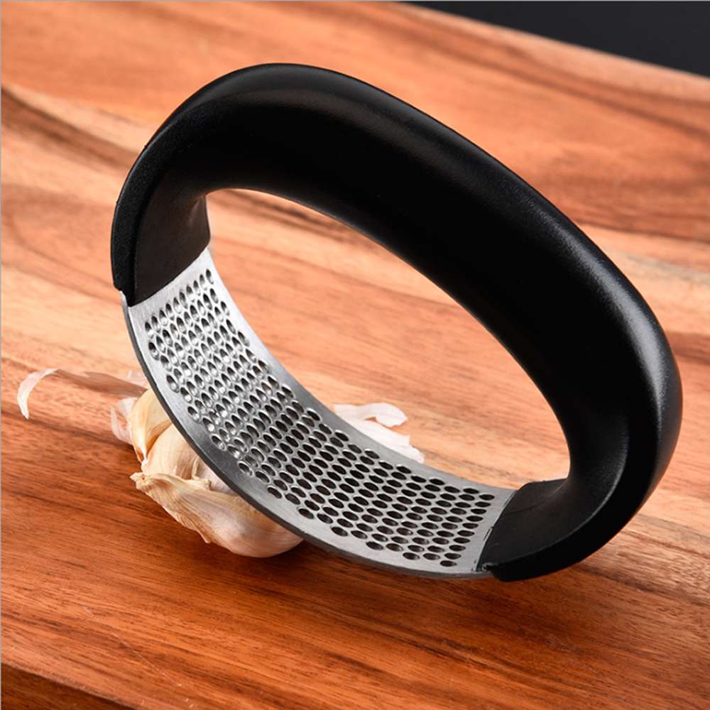 Stainless Steel Garlic Press - Easy to Use & Clean Kitchen Gadget