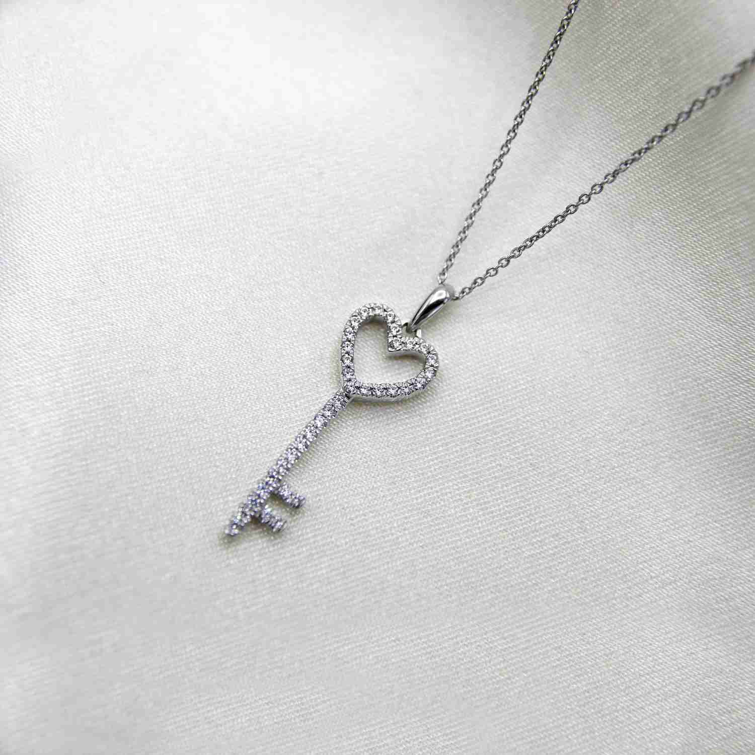 10K White Gold 1/4 Carat TW Round (I2 Clarity) Diamond Key Heart Pendant Necklace