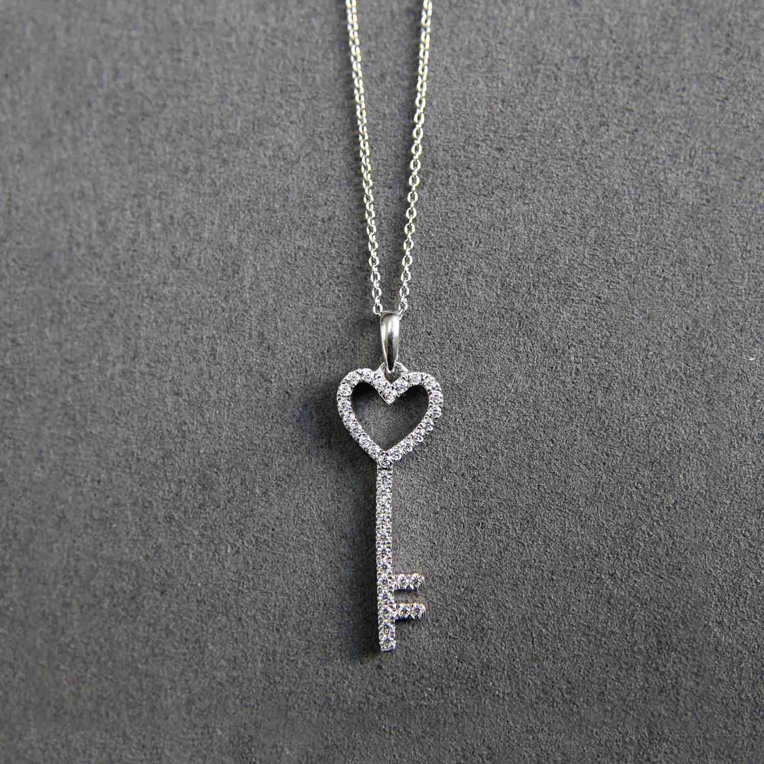 10K White Gold 1/4 Carat TW Round (I2 Clarity) Diamond Key Heart Pendant Necklace