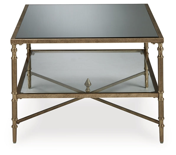 Cloverty Rectangular Cocktail Table with Aged Goldtone Finish
