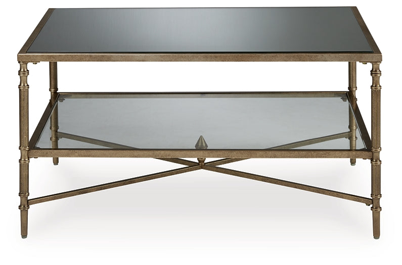 Cloverty Rectangular Cocktail Table with Aged Goldtone Finish