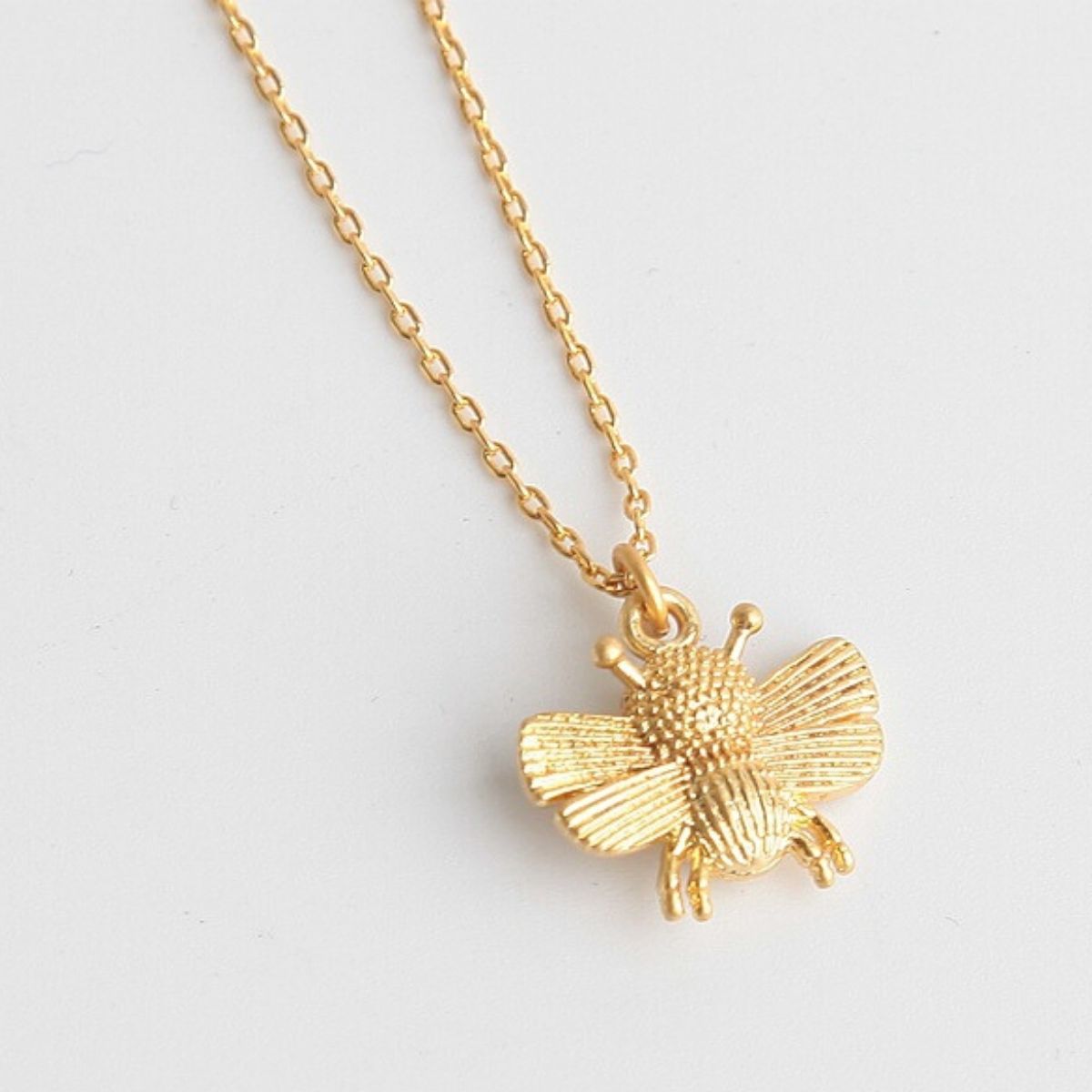 All Abuzz Bee Mini Pendant Necklace by kate spade new york