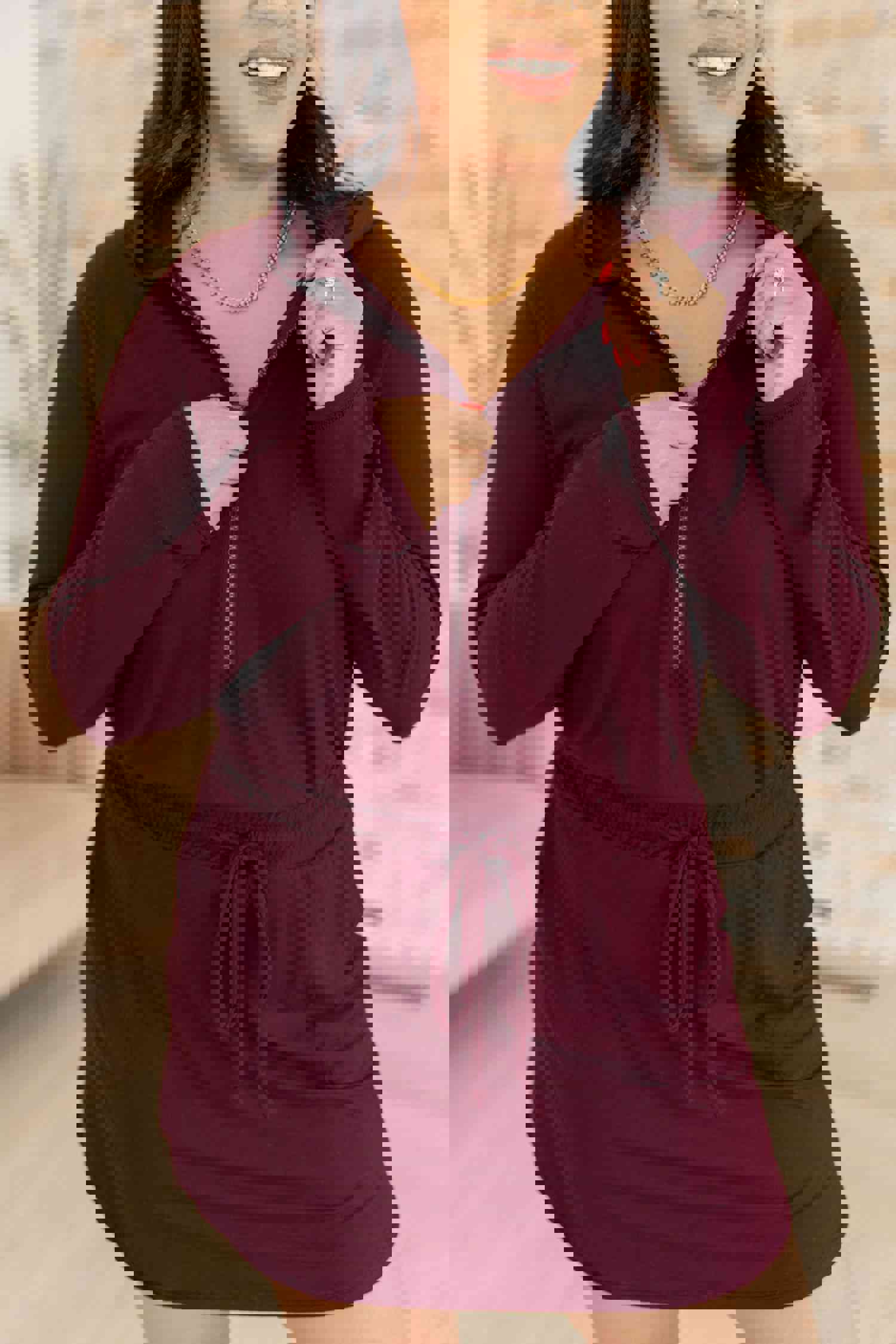 Getting Out Long Sleeve Hoodie Romper in Maroon