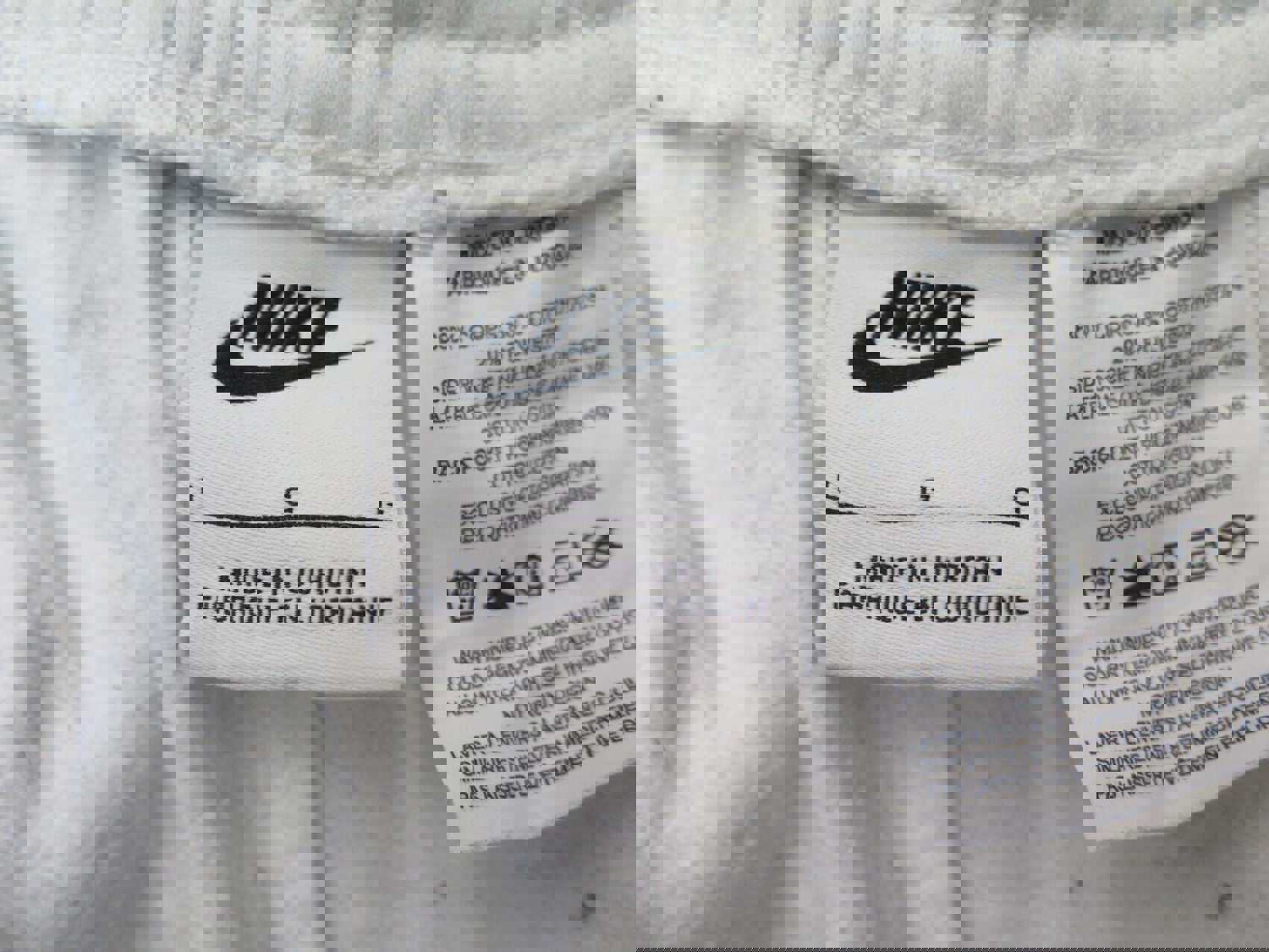 Nike Men's Large White Athletic Running Shorts with Swoosh Logo