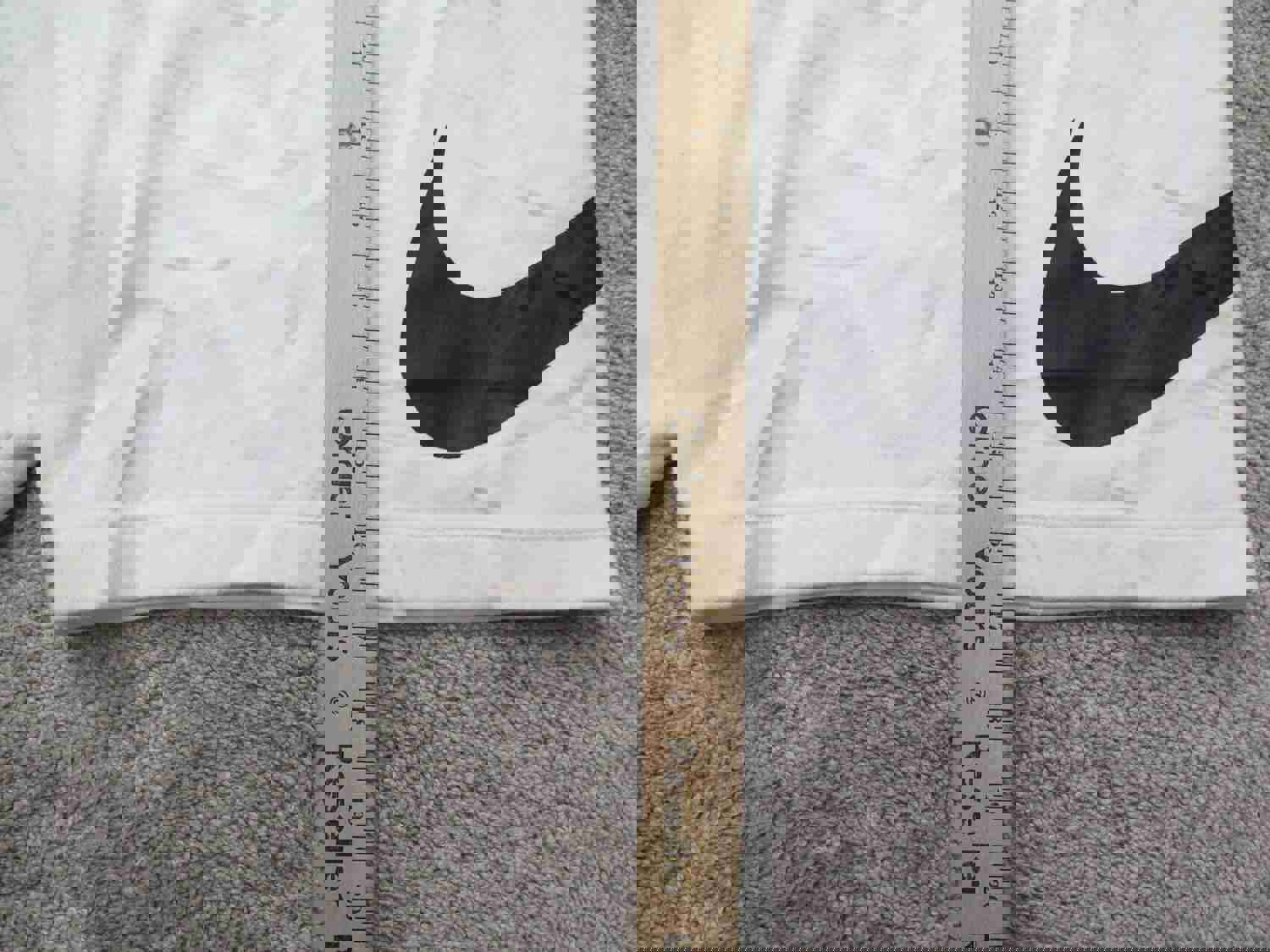 Nike Men's Large White Athletic Running Shorts with Swoosh Logo