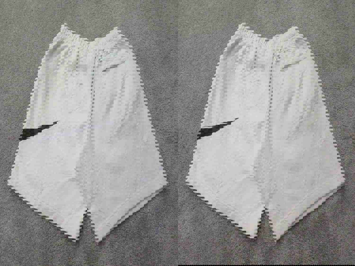 Nike Men's Large White Athletic Running Shorts with Swoosh Logo