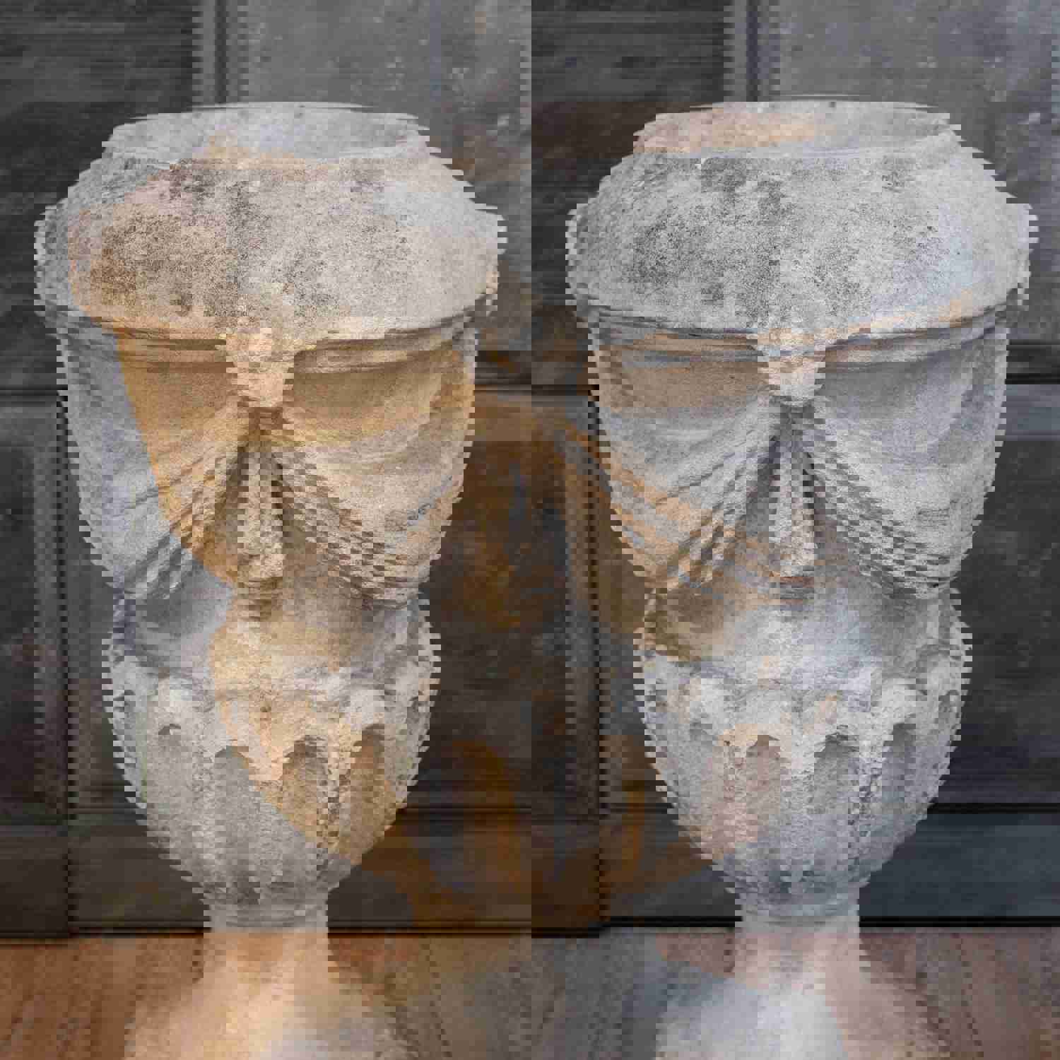 Pair of 18th Century Carved Limestone Garden Urns with Draped Swags and Fluted Bowls
