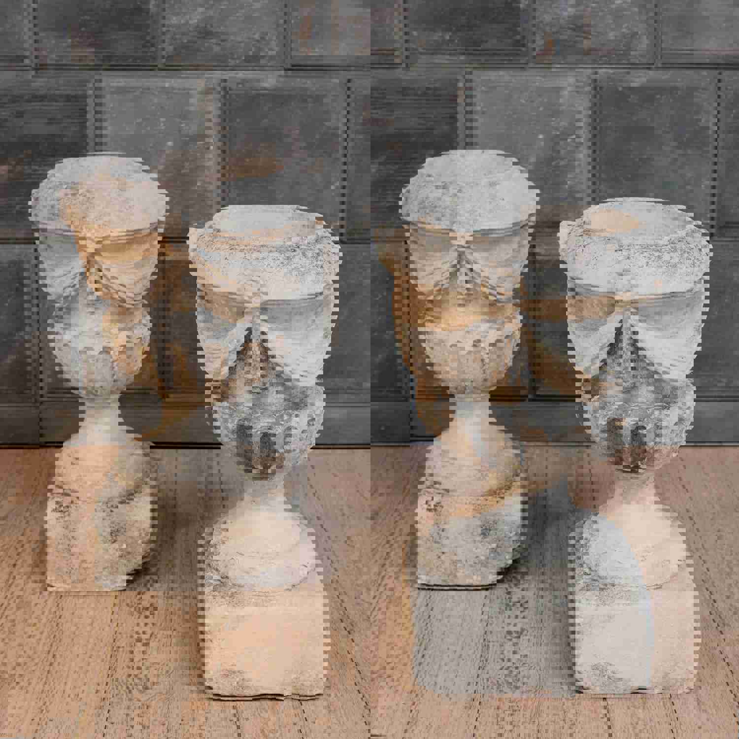 Pair of 18th Century Carved Limestone Garden Urns with Draped Swags and Fluted Bowls