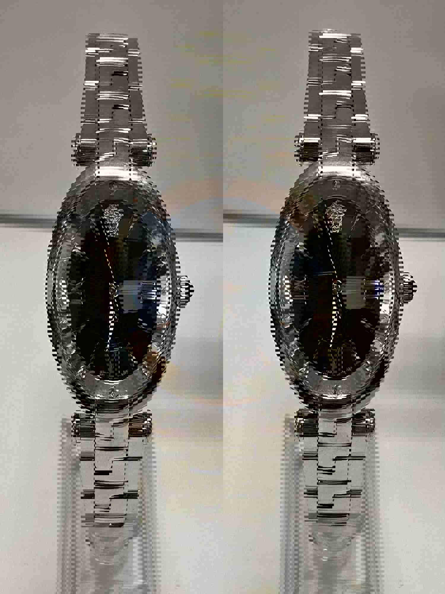 VERSACE Stainless Steel Elegance Unisex Watch with Unique Black Dial