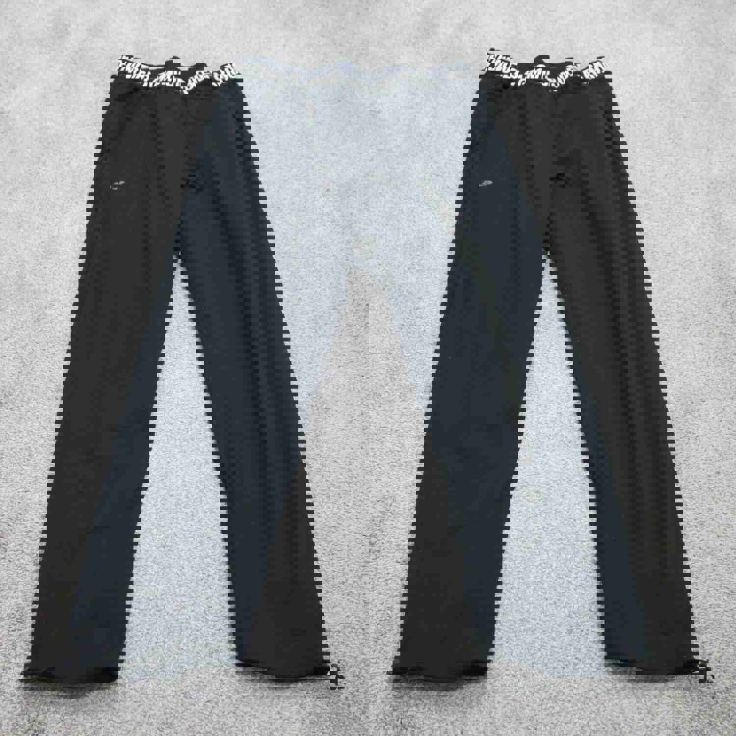 Women's Under Armour Black HeatGear Pants with Swoosh Logo