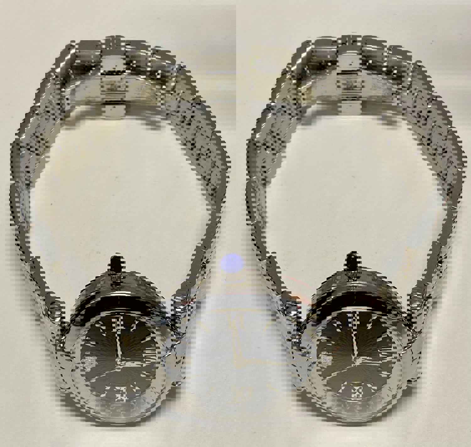 VERSACE Stainless Steel Elegance Unisex Watch with Unique Black Dial