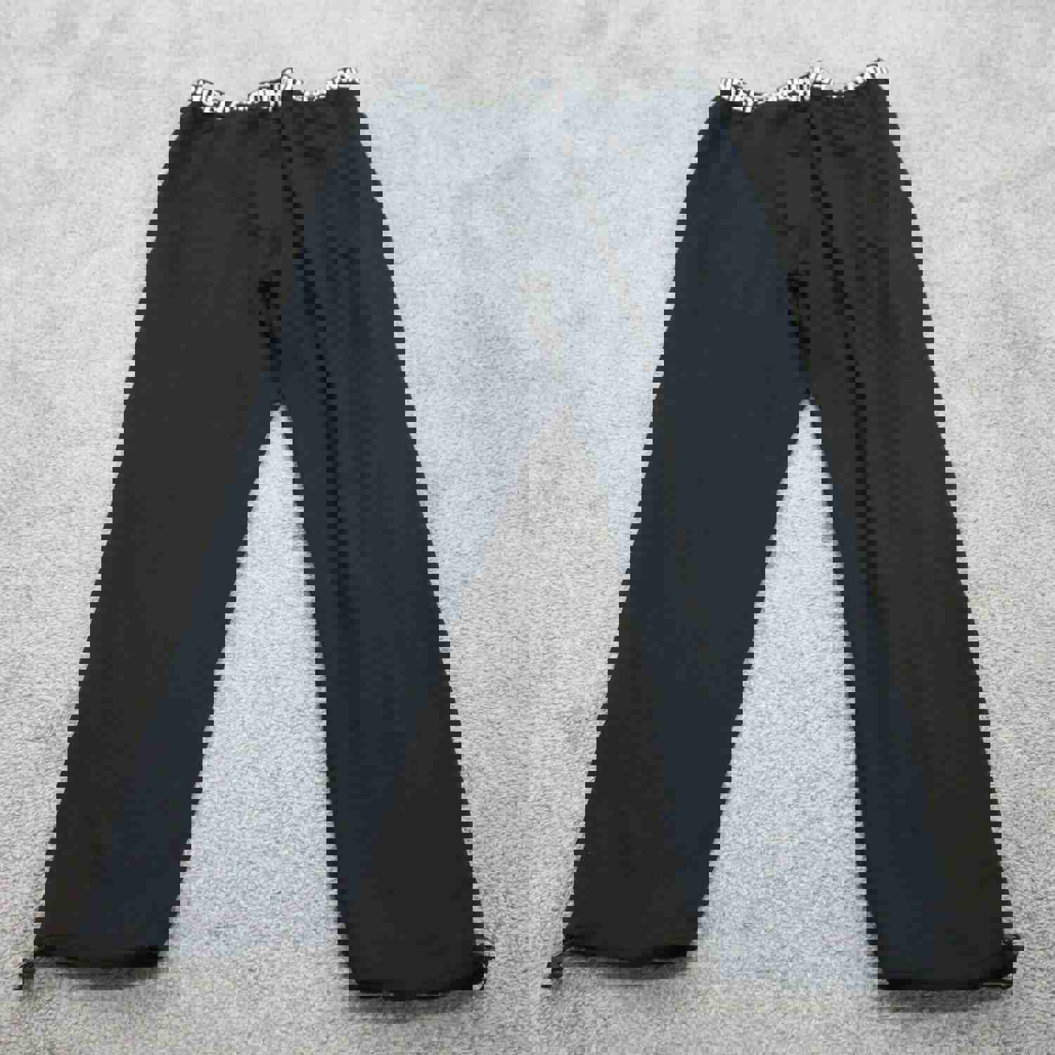 Women's Under Armour Black HeatGear Pants with Swoosh Logo