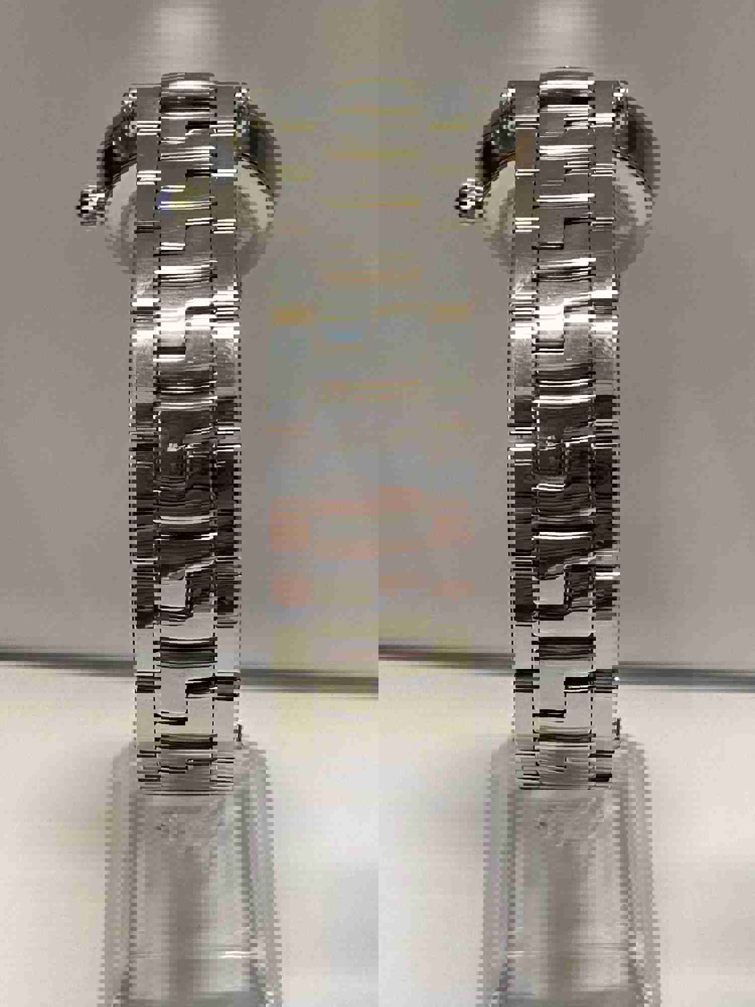VERSACE Stainless Steel Elegance Unisex Watch with Unique Black Dial