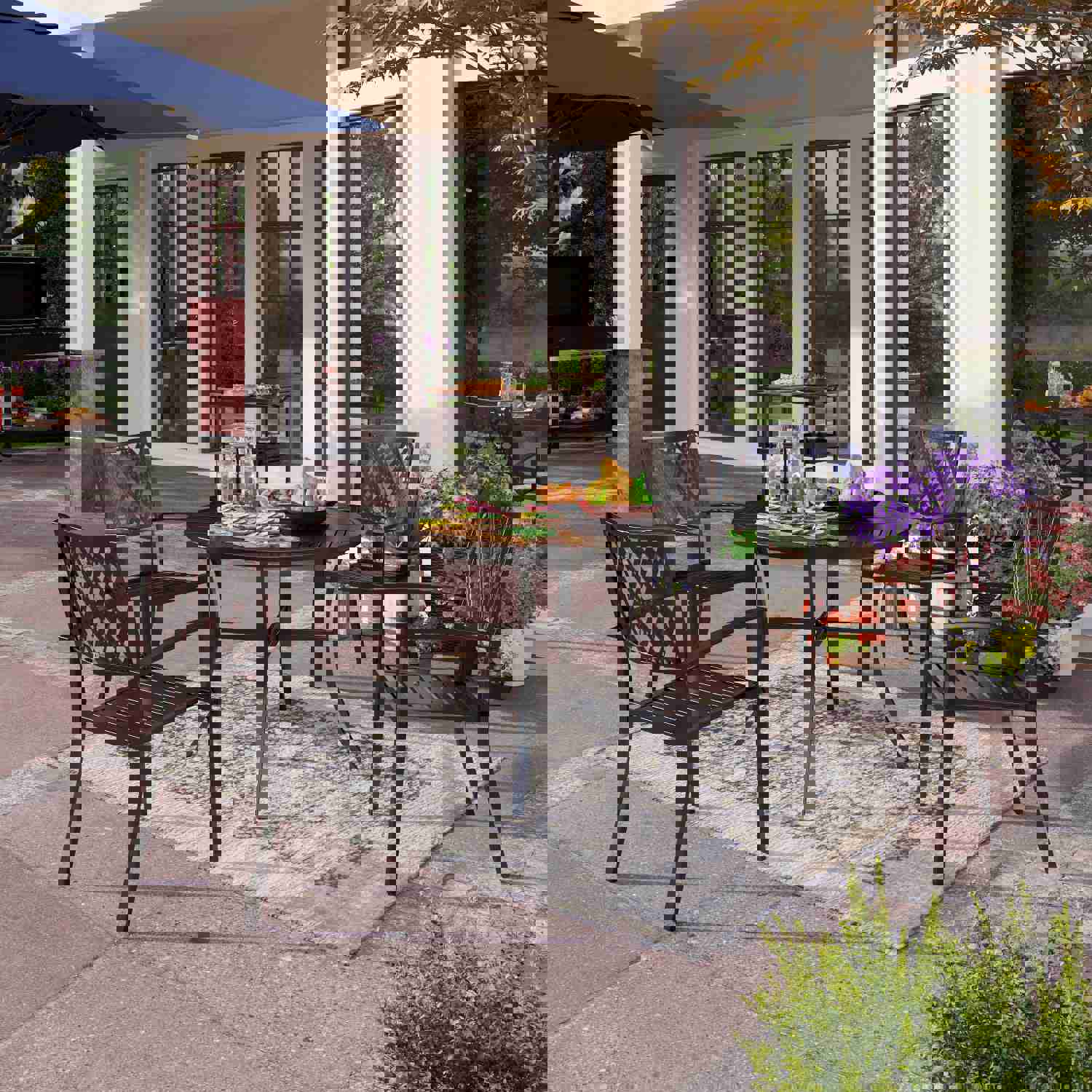 PHI VILLA 5-Piece Outdoor Dining Set with Patterned Stackable Chairs and Rust-Resistant Metal Table