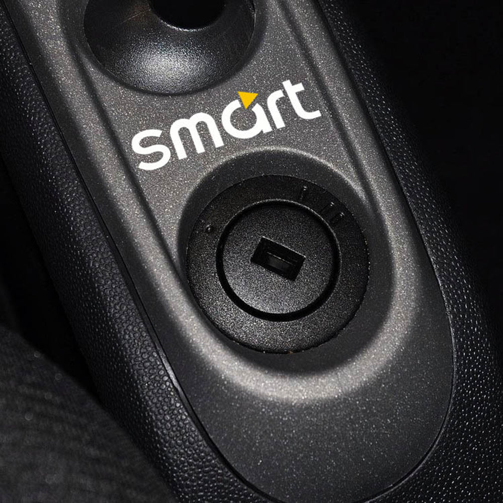 Upgraded Smart Car Interior with Reflective Gearshift Sticker