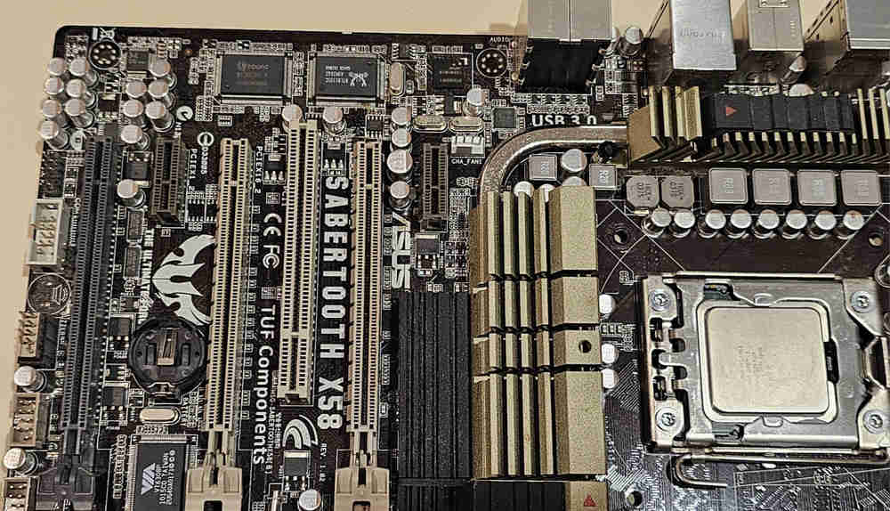 ASUS SABERTOOTH X58 R2.0/GEN3 AM3 Motherboard Bundle with 3 Intel CPUs