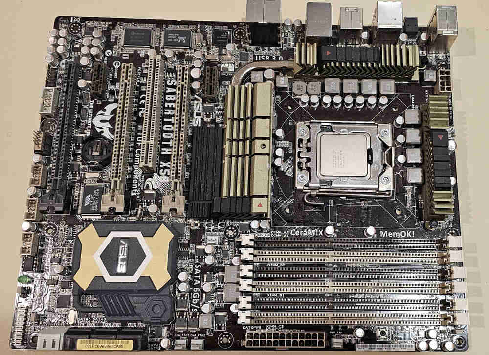 ASUS SABERTOOTH X58 R2.0/GEN3 AM3 Motherboard Bundle with 3 Intel CPUs