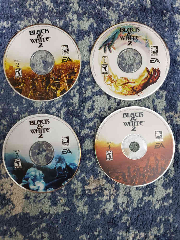 Black & White 2 - 4-Disc PC Game Set with Manual