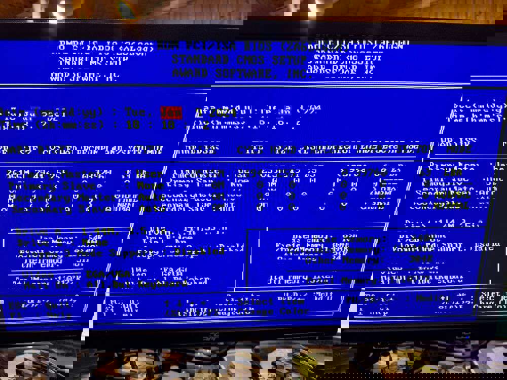 GA-6VXE7 Motherboard with CPU, RAM, IO Shield, Cables, and AGP Card