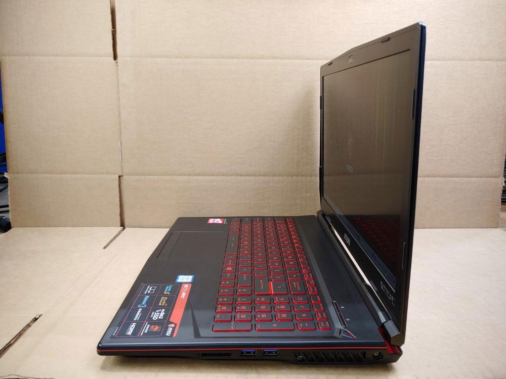 MSI GL63 8RC Gaming Laptop - 15.6 Inch, i5-8300H, 16GB RAM, 256GB SSD + 1TB HDD, GTX 1050, Windows 11