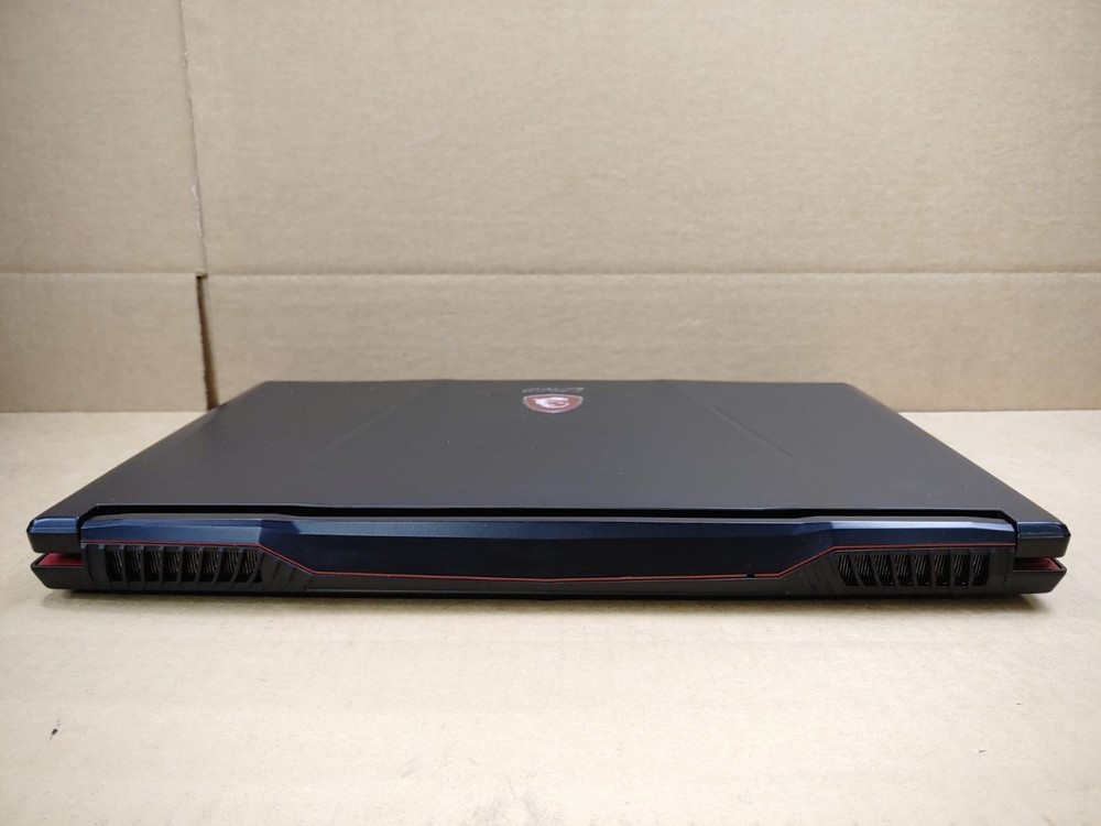 MSI GL63 8RC Gaming Laptop - 15.6 Inch, i5-8300H, 16GB RAM, 256GB SSD + 1TB HDD, GTX 1050, Windows 11